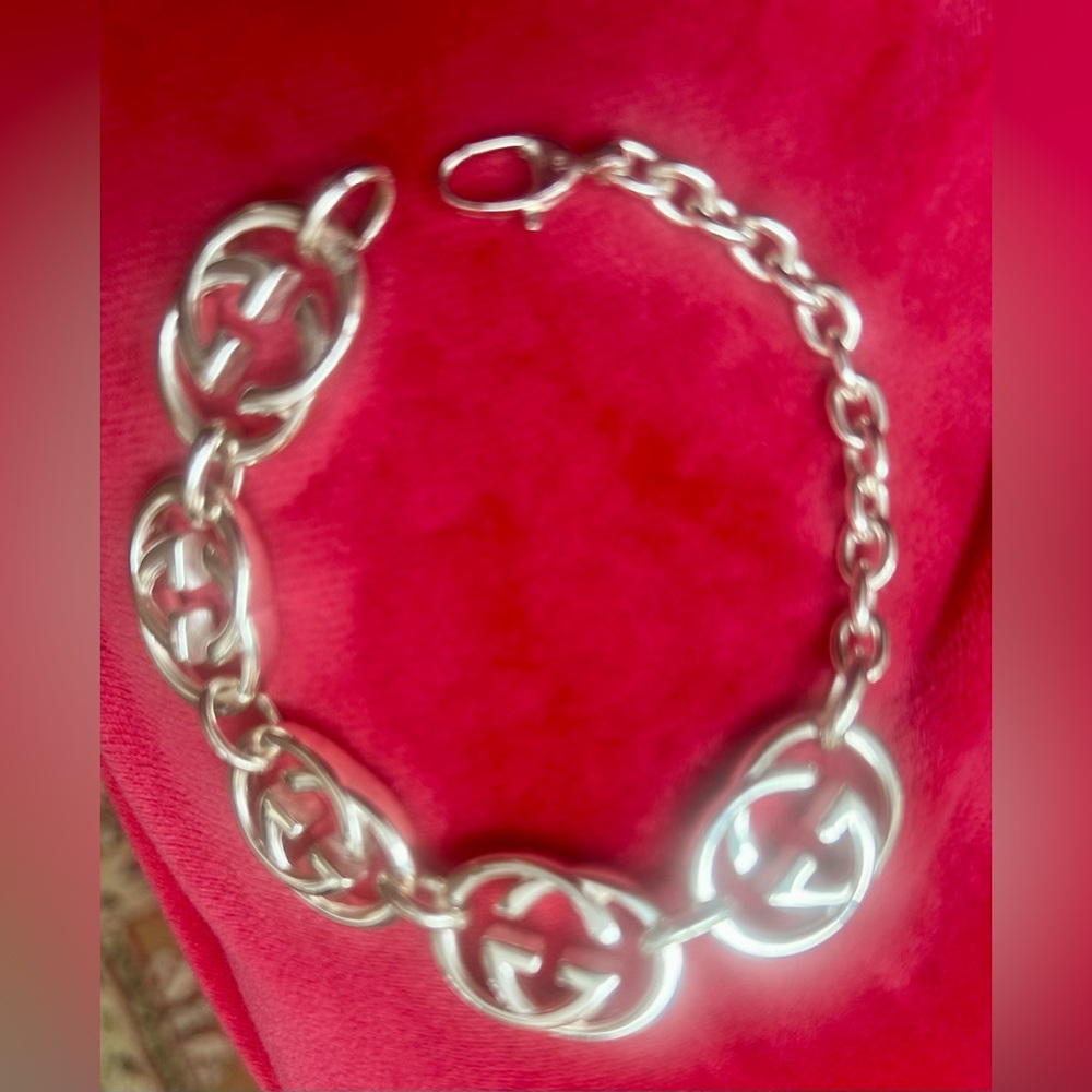 Gucci Interlocking GG Sterling Silver Bracelet with box and Gucci pouch.